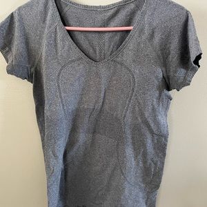 Run swiftly v neck.